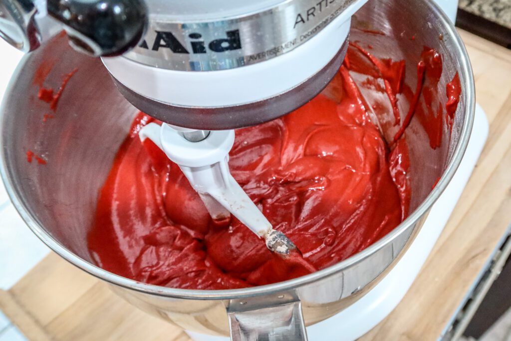 mixing the red velvet cake batter