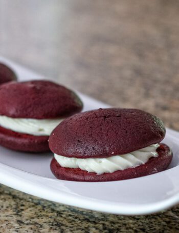 red velvet whoopie pies on a small serving tray