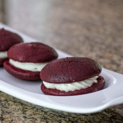 red velvet whoopie pies on a small serving tray