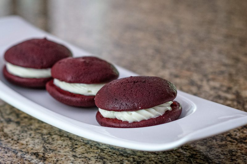 red velvet whoopie pies on a small serving tray