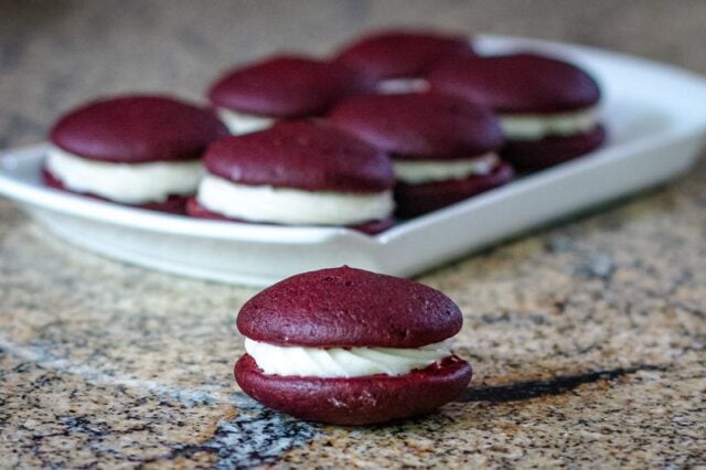 a tray of red velvet whoopie pies