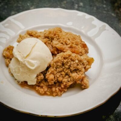 rhubarb crisp and ice cream on a plate