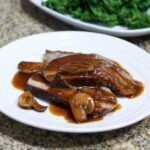 roast beef and gravy on a plate