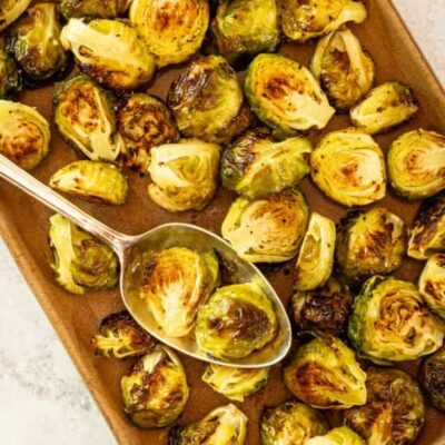 Roasted Brussels sprouts on a serving tray.