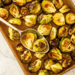 Roasted Brussels sprouts on a serving tray.