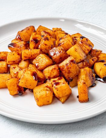 butternut squash on a plate with balsamic glaze