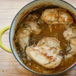 braised chicken with rosemary in a dutch oven
