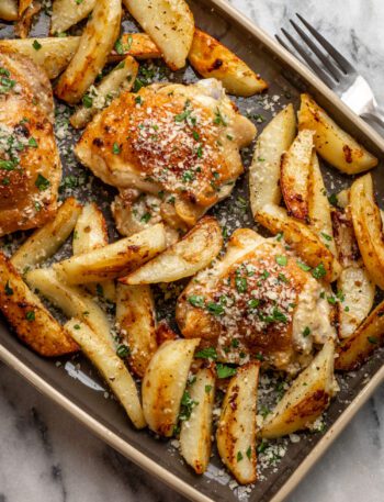 sheet pan garlic and parmesan chicken thighs with potatoes