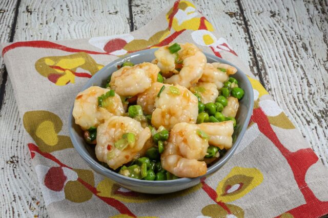 shrimp and peas in a bowl