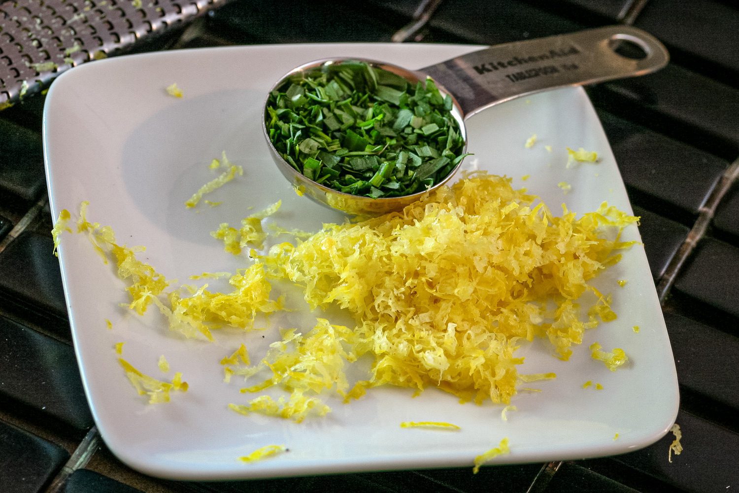 lemon zest and tarragon on a plate