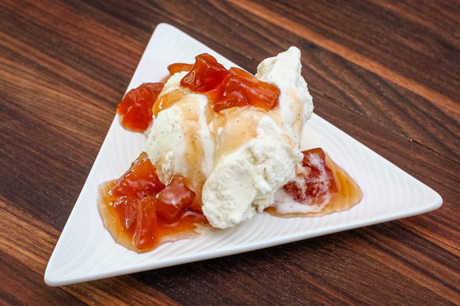 simple vanilla ice cream on a small dessert dish