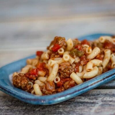 macaroni and ground beef on a small plate