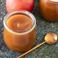 Sweet apple butter in a glass jar.