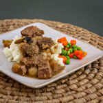 slow cooker beef and beer over mashed potatoes