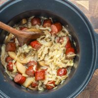 Kielbasa, cabbage, and apples in the slow cooker.