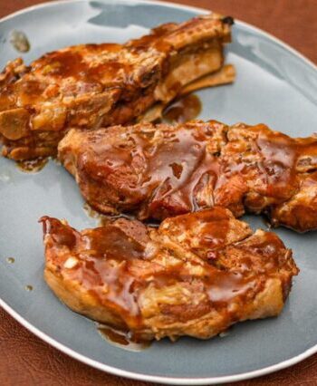 slow cooker marmalade spareribs on a serving plate