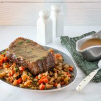 slow cooker pot roast and vegetables on a serving platter