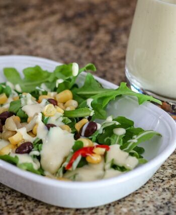 sour cream dressing on a small salad