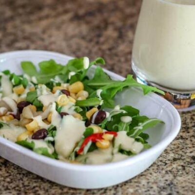 sour cream dressing on a small salad
