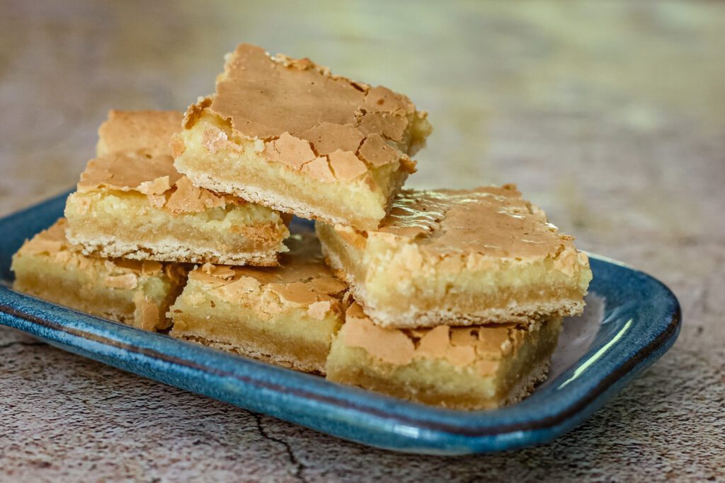 chess squares made with a cake mix and cream cheese topping.