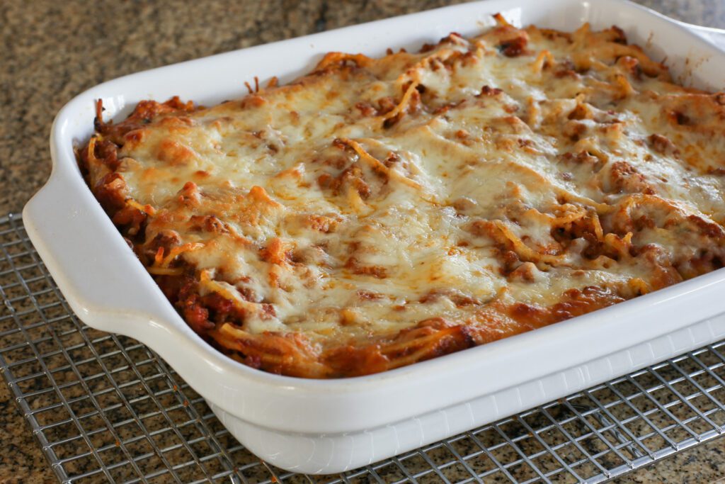 spaghetti casserole with ground beef and mozzarella cheese topping
