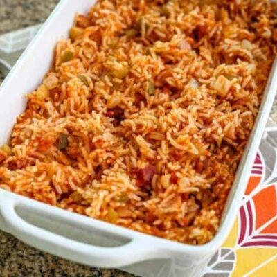 A serving dish with Spanish rice.