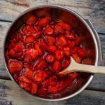 bowl of orange flavored strawberries with orange liqueur