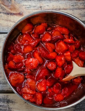A bowl of strawberries macerated with orange liqueur