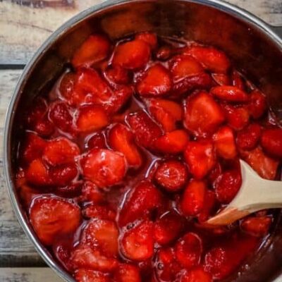 A bowl of strawberries macerated with orange liqueur