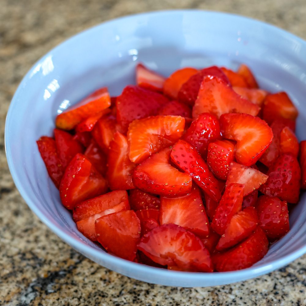 strawberry sauce in a blue bowl