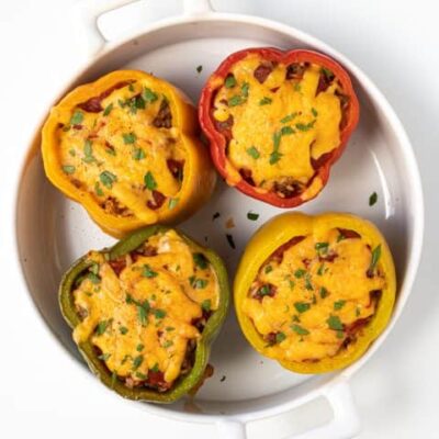 stuffed peppers in a baking dish
