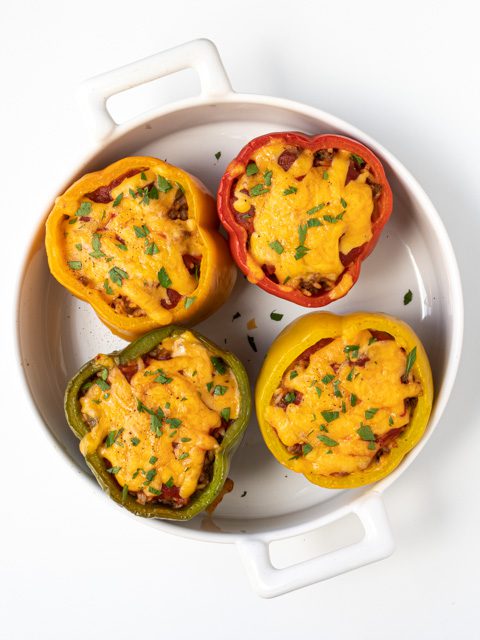 stuffed peppers in a baking dish