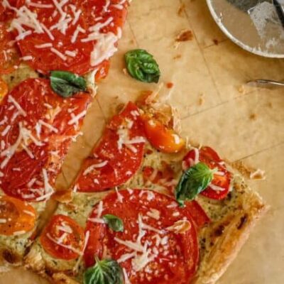 A sliced summer tomato tart.