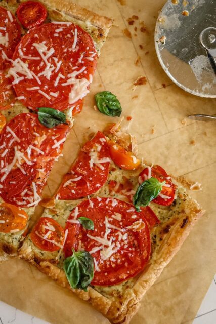 A sliced summer tomato tart.