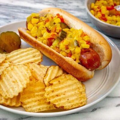 Home canned corn relish on a hot dog.