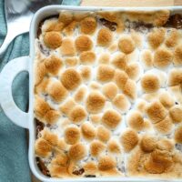 Sweet potato casserole for two prep: baked sweet potato casserole with browned marshmallows, ready to serve.