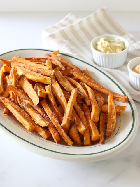 sweet potato fries on a serving plate