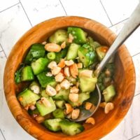 A small bowl with Thai cucumber salad.