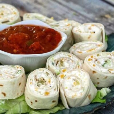 tortilla roll-ups with salsa for serving