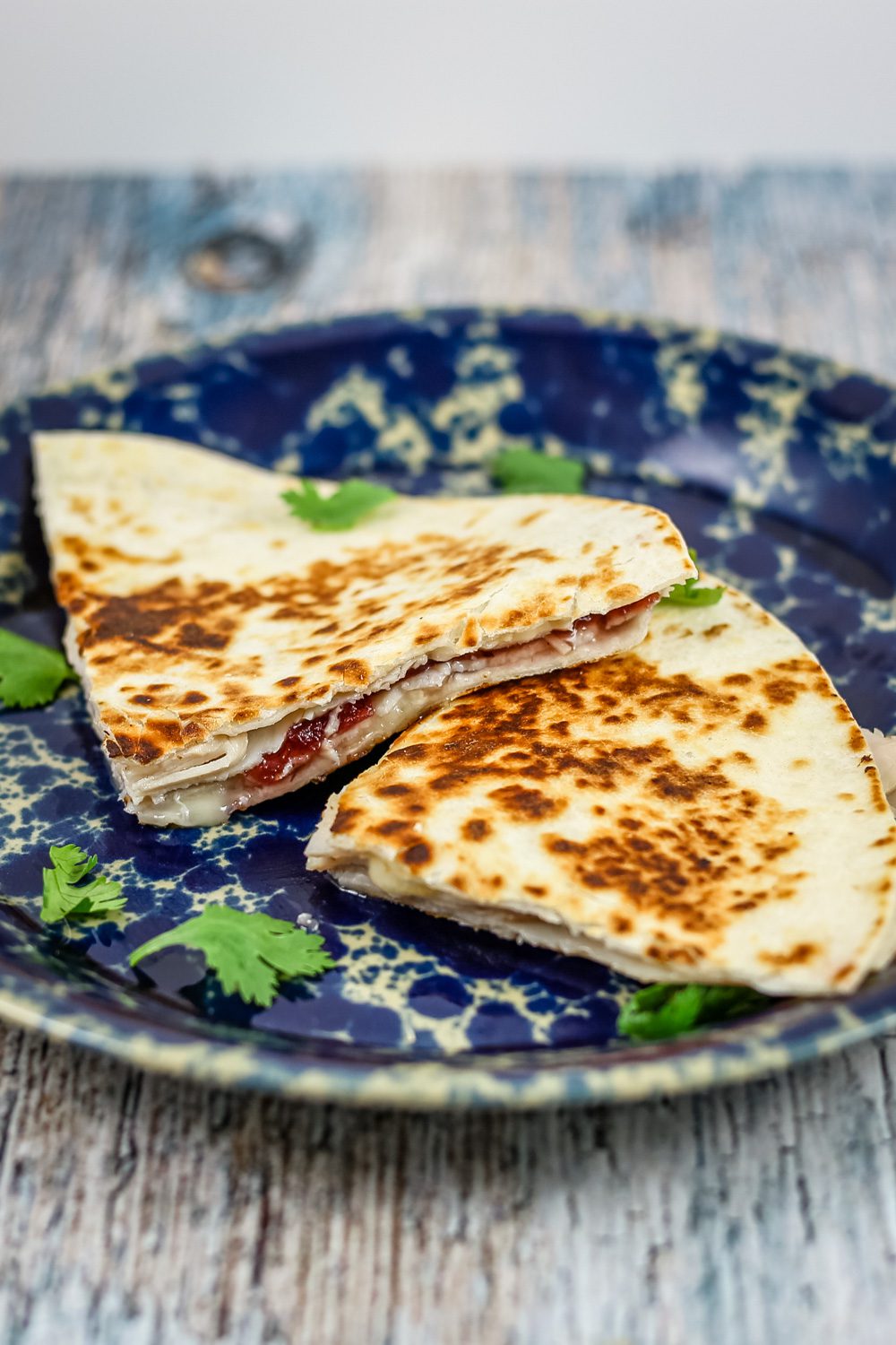 leftover turkey quesadilla with cranberry sauce and brie