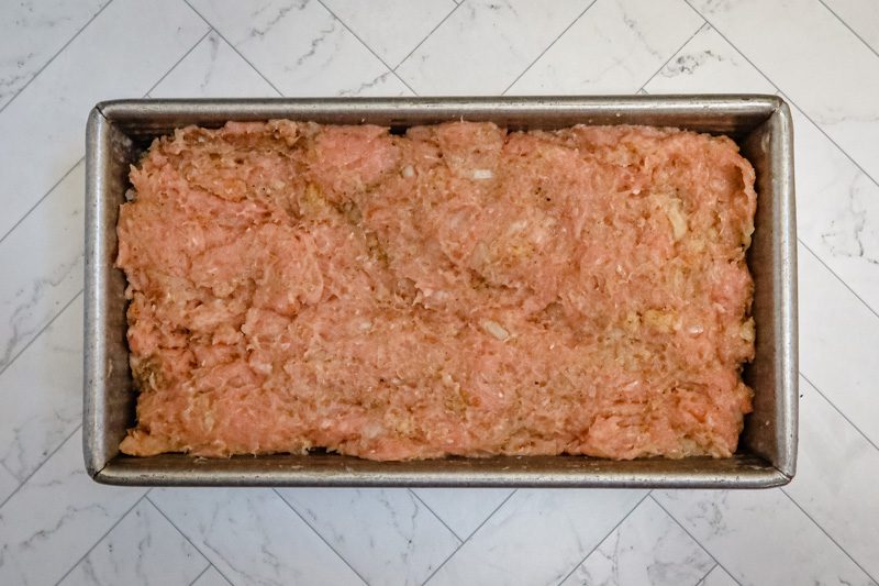 pack the turkey meatloaf mixture in the pan
