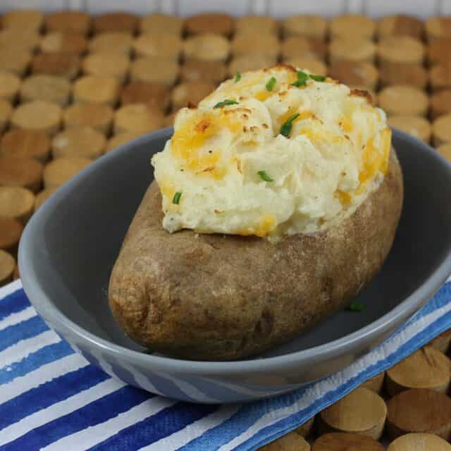 Stuffed baked potatoes with cheese.