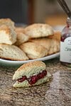 Fresh cherry jam sandwiched between two fluffy biscuits.