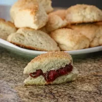 Golden homemade biscuits with cherry filling.