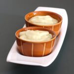 vanilla pudding in small dessert bowls