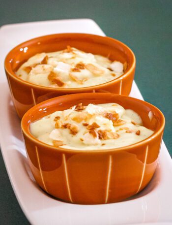 vanilla pudding with toasted coconut flakes