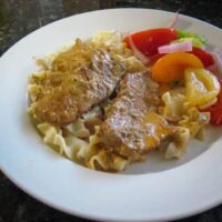 veal steaks on noodles