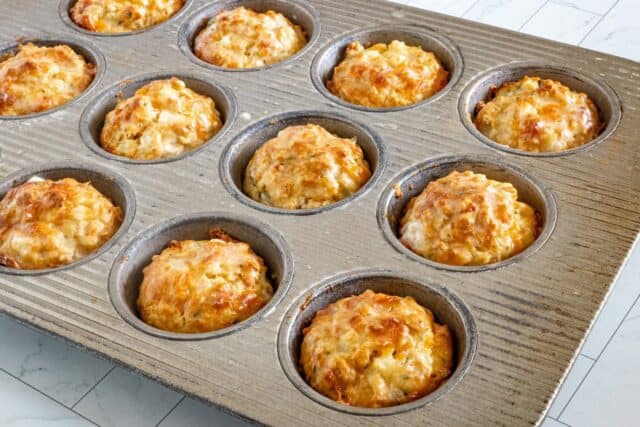 Vidalia onion muffins in the muffin tin.